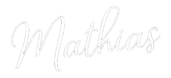 Mathias signature logo in white script.